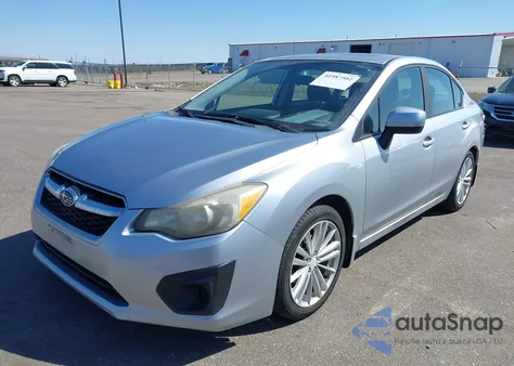 2012 Subaru Impreza 2.0I Premium z USA, uszkodzony, nr VIN JF1GJAD62CH022710